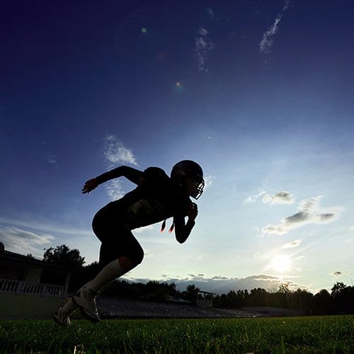sports-package-football-player-running-on-field